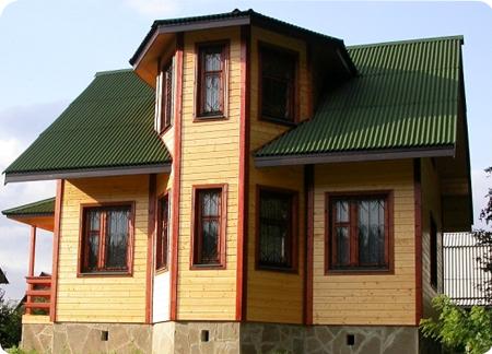 дом из деревянного бруса с эркером